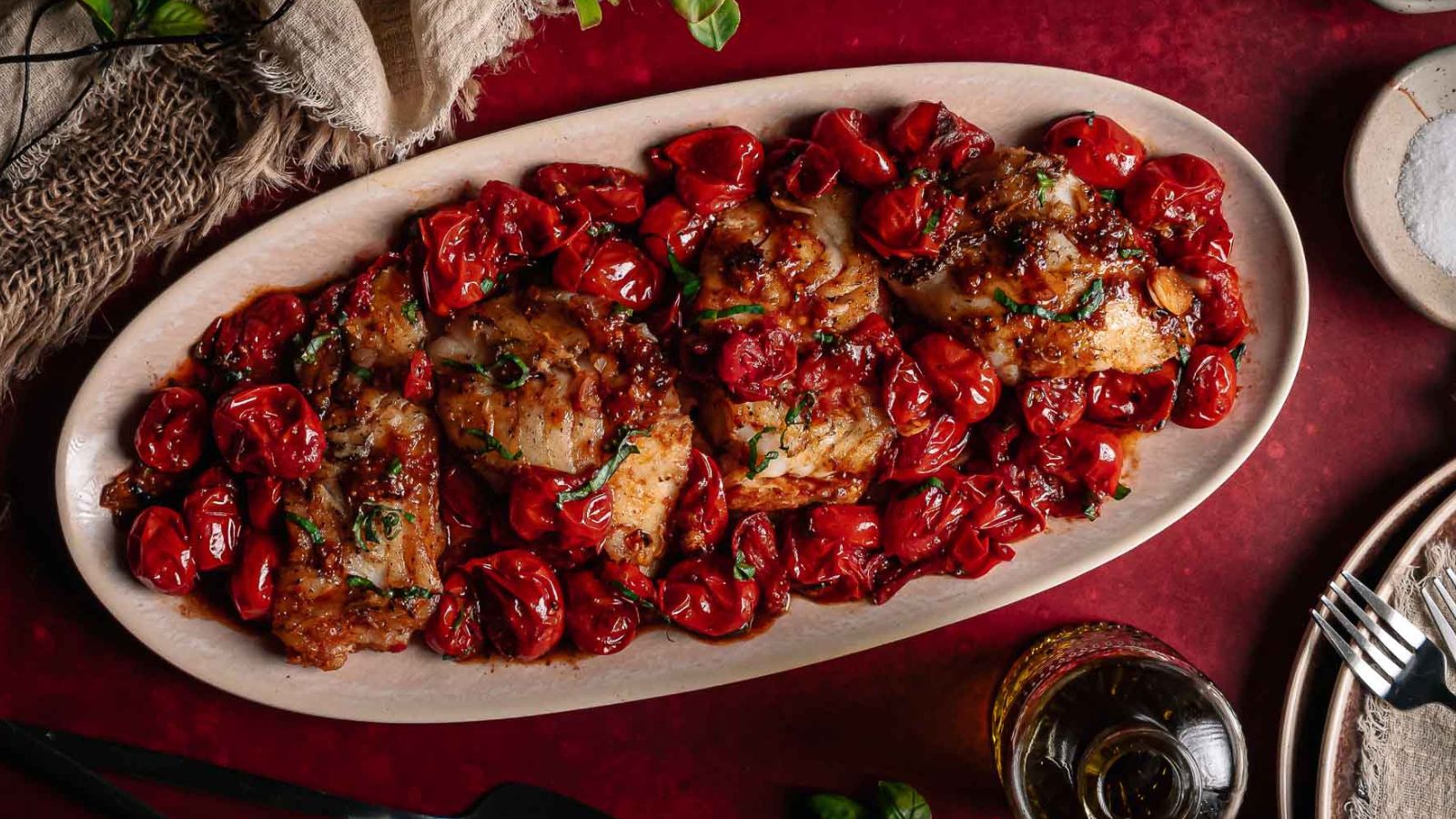 Pan-seared cod topped with blistered cherry tomato sauce.