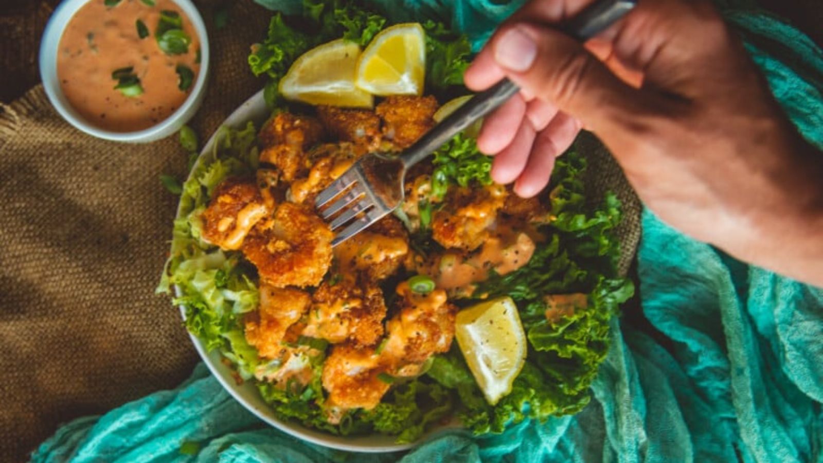 Air fryer bang bang shrimp tossed in spicy creamy sauce.