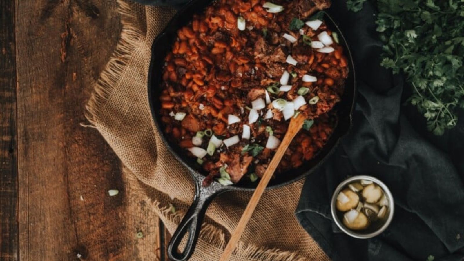 Brisket BBQ beans cooked thick with smoky twice-smoked brisket pieces.