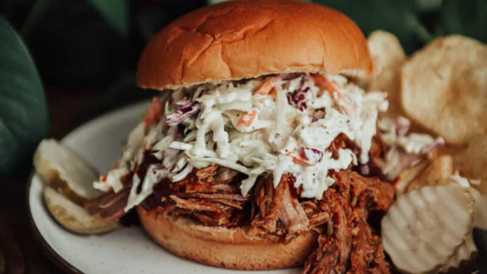 Pulled pork slow cooked until it shreds easily for sandwiches or tacos.