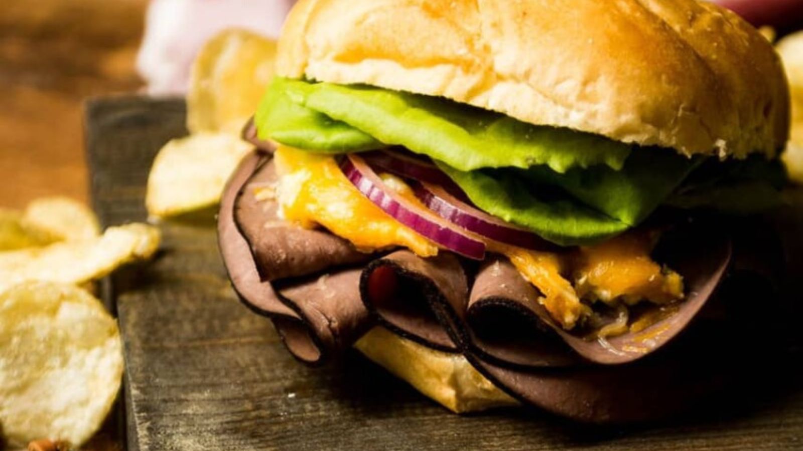 Jalapeno popper roast beef melts with cheese and peppers on toasted rolls.