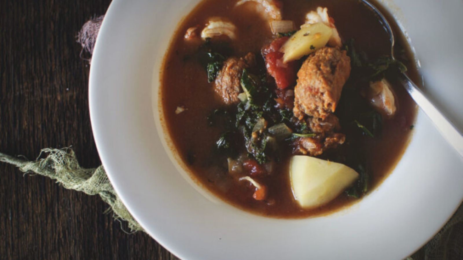 Stew of shrimp and chorizo simmered spicy and rich.