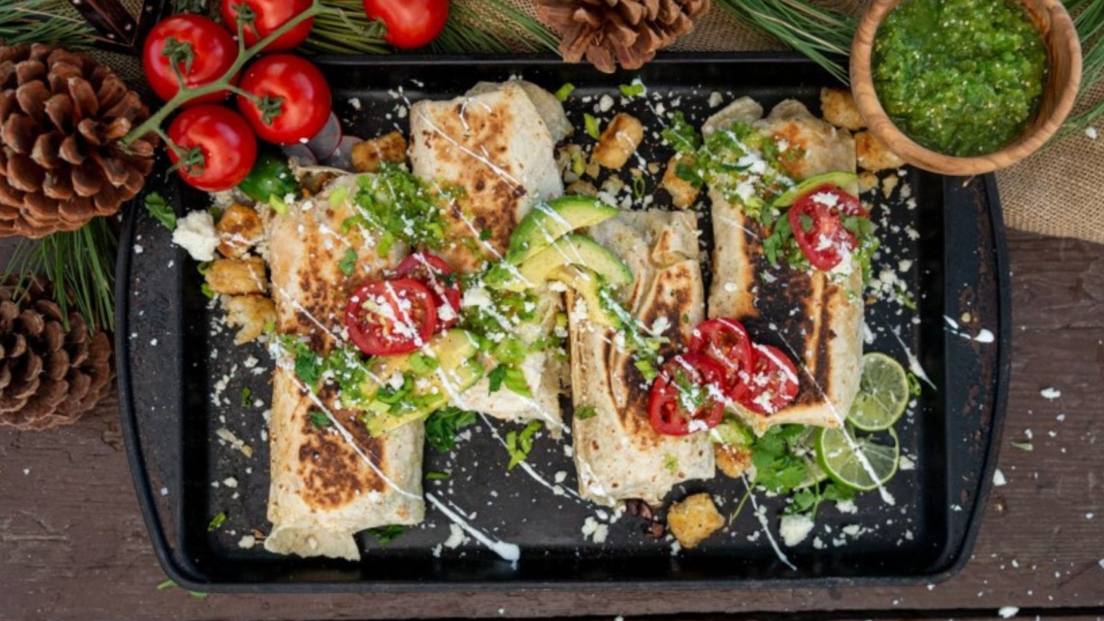 Breakfast burritos wrapped with eggs, sausage, and cheese for camping.