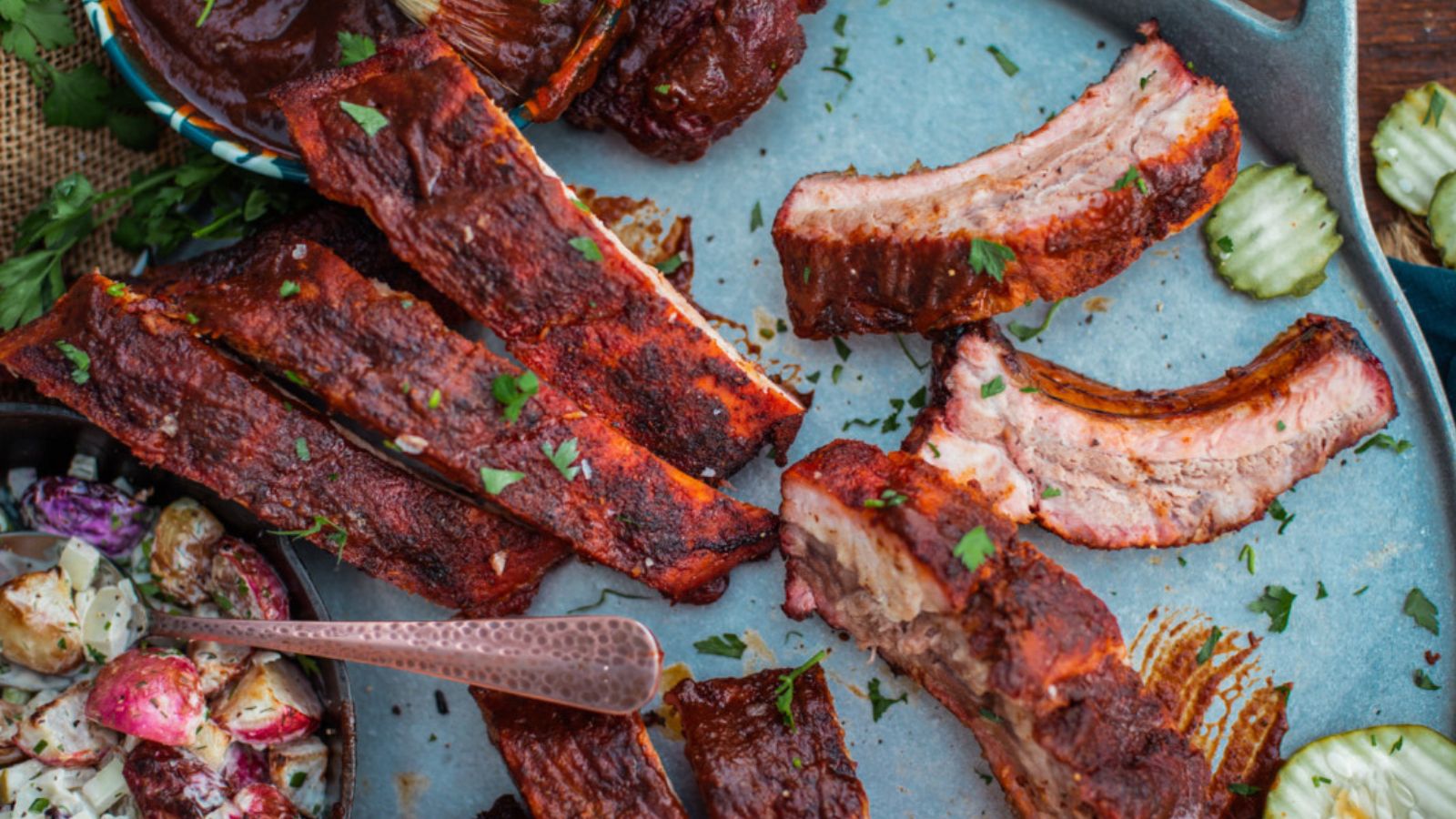 Smoked baby back ribs dry rubbed with dark bark and juicy inside.