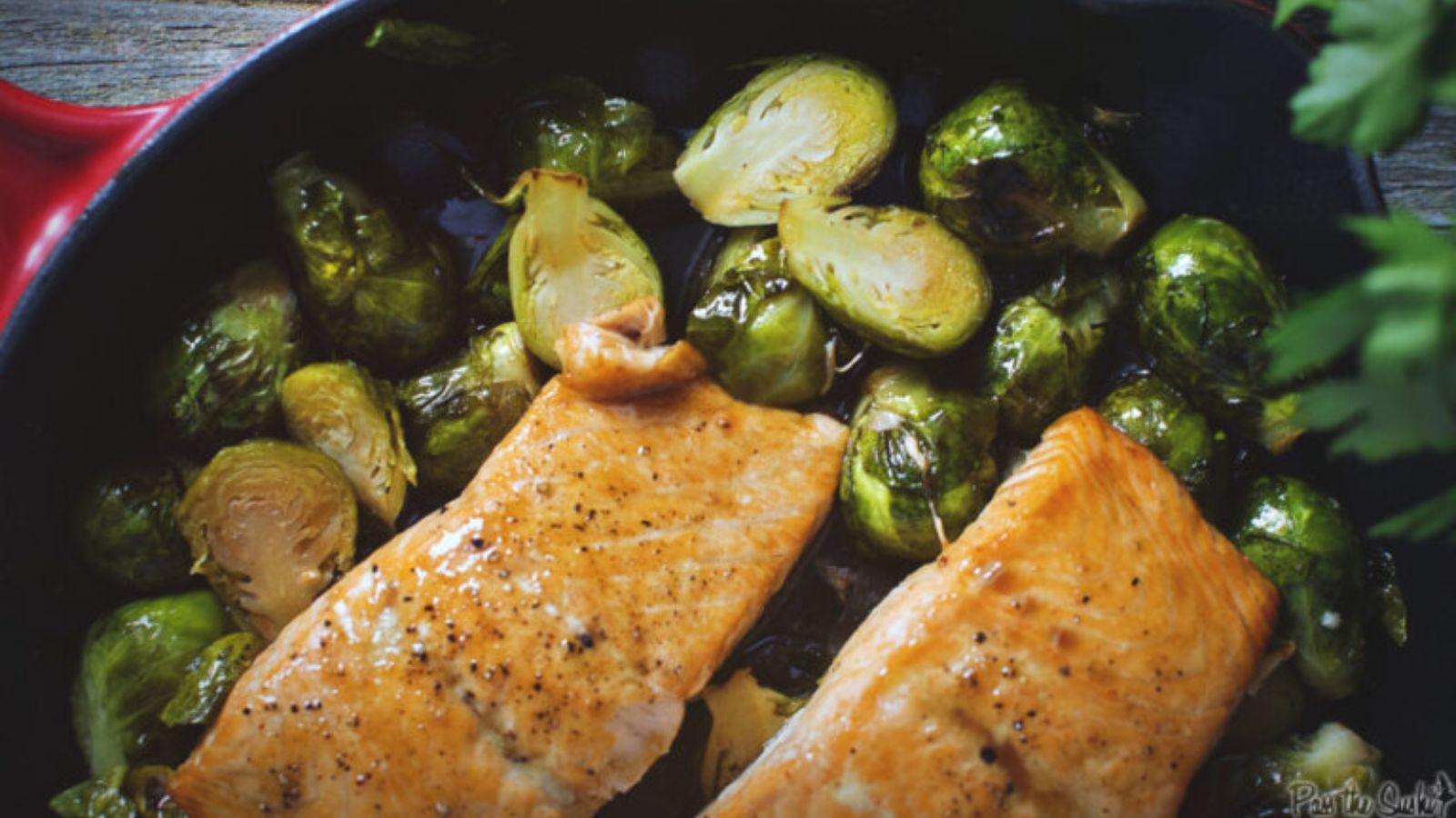 Salmon roasted with maple glaze and golden crust.
