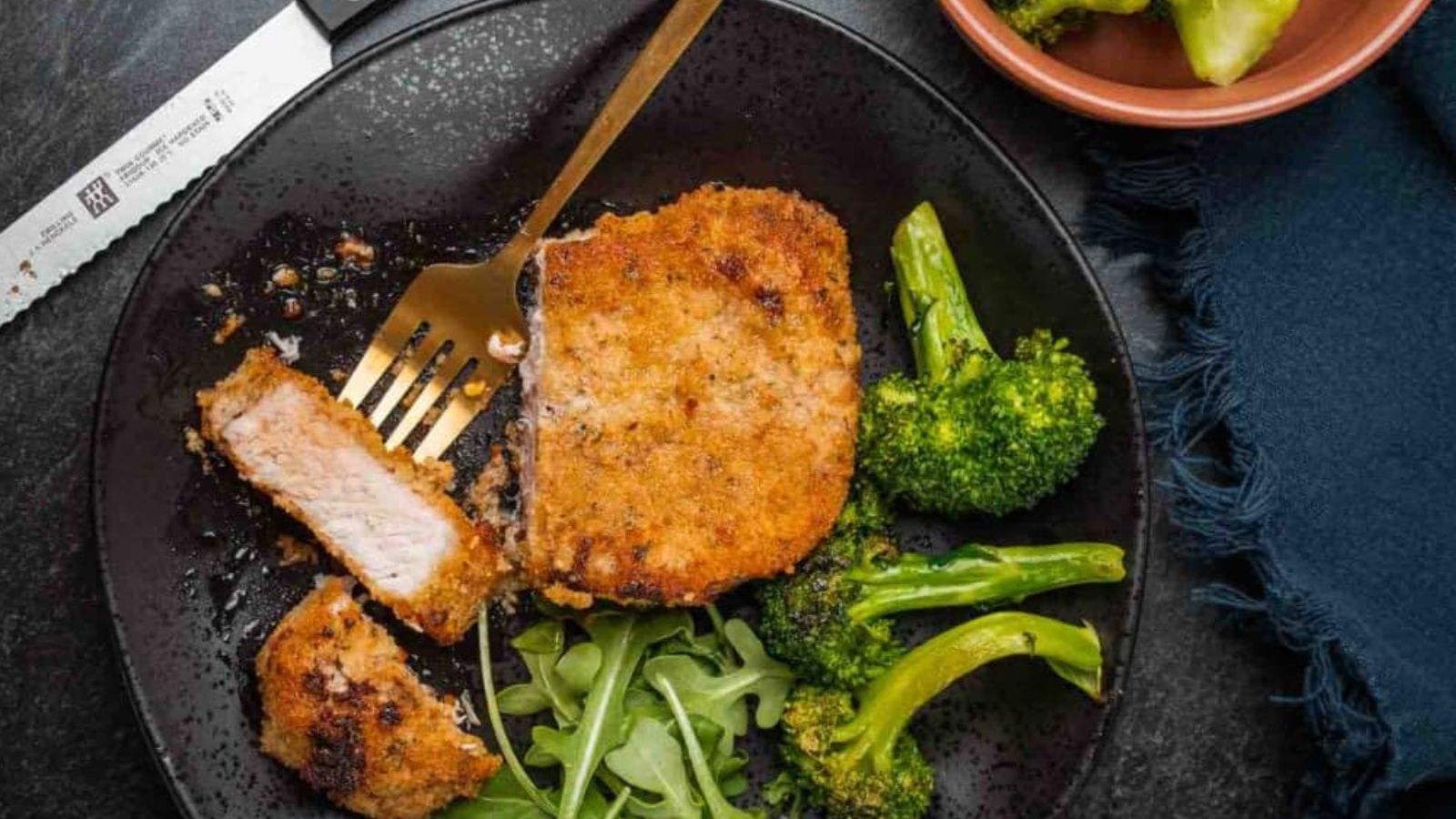 Pork chops baked shake-and-bake style crispy coated.