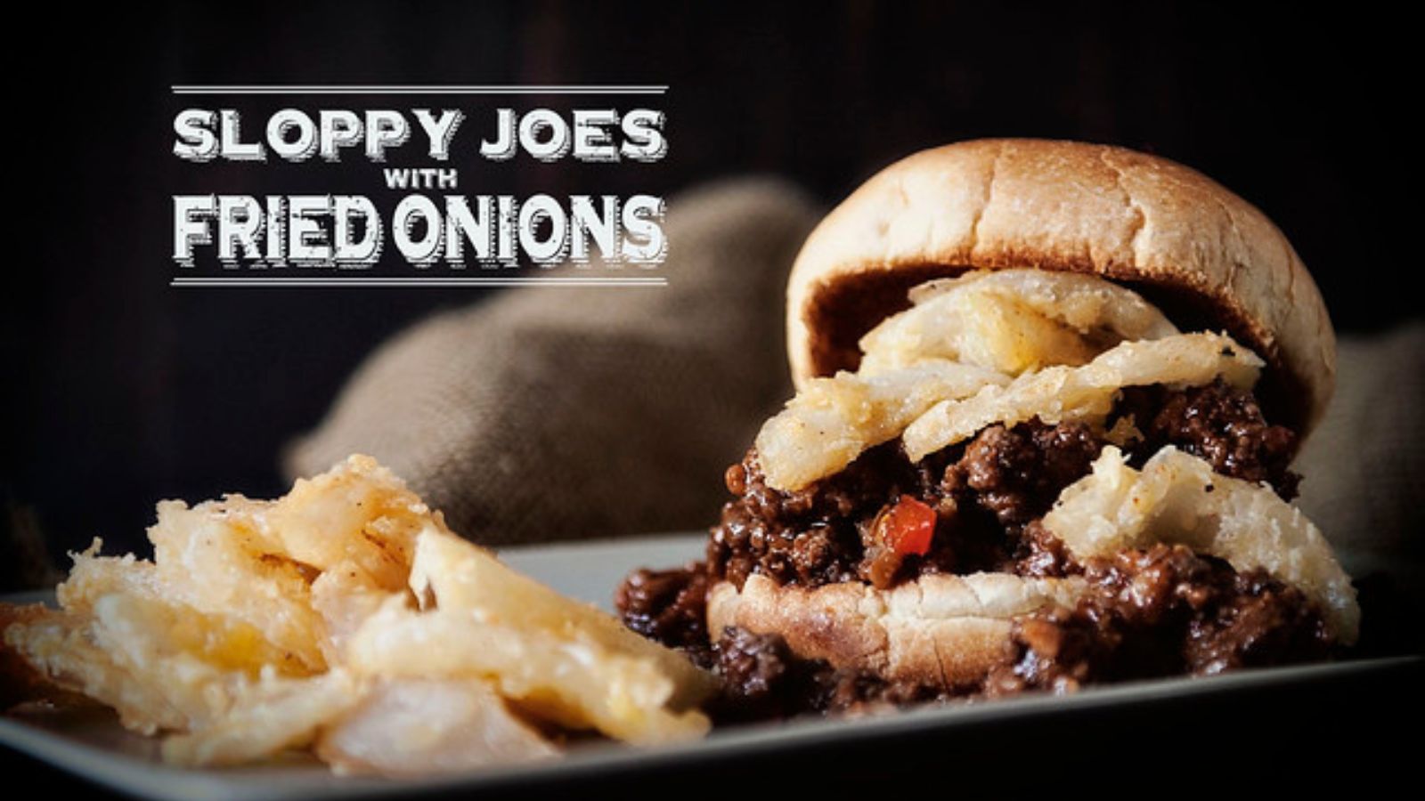 Sloppy Joes topped with fried onions on soft buns.