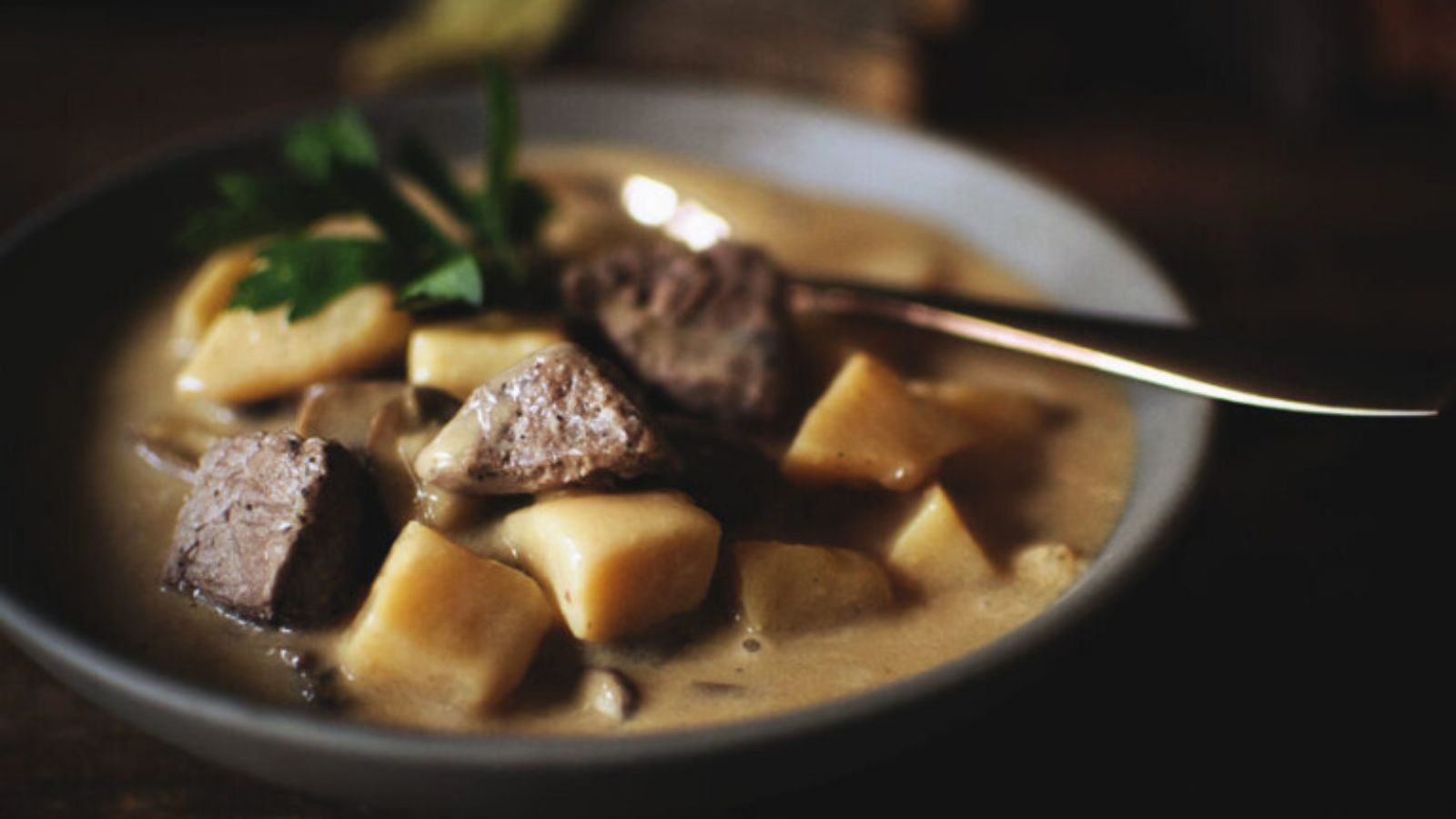 Steak and potato soup hearty with chunks of beef and potatoes.