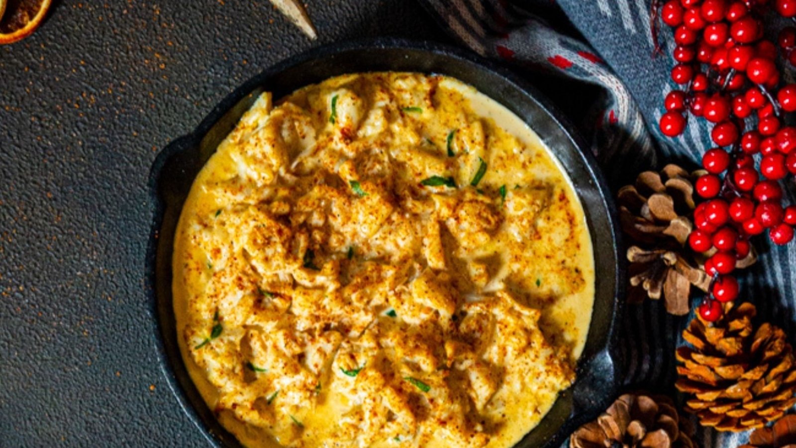 Crab Imperial baked golden with tender crab meat in creamy sauce.