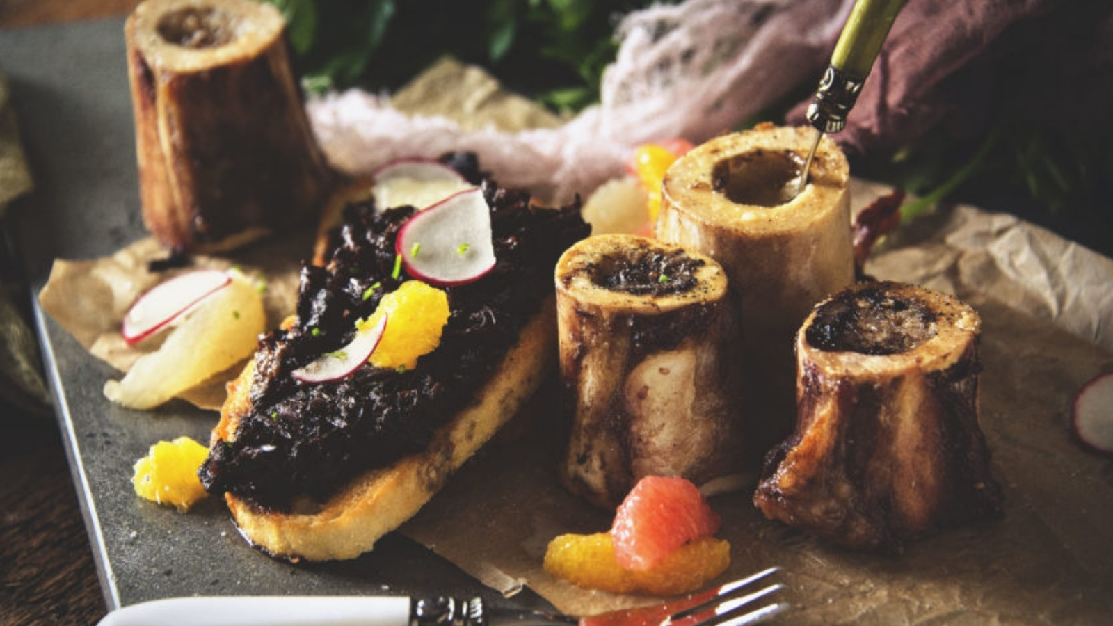 Bone marrow browned and topped with oxtail marmalade.