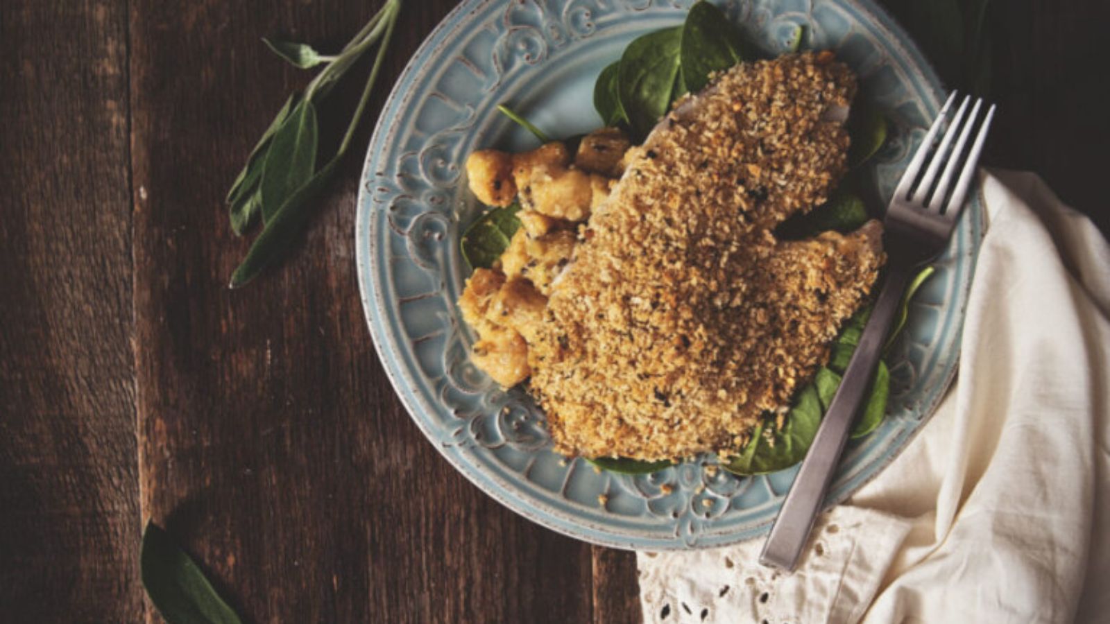 Tilapia baked with chipotle seasoning and browned edges.