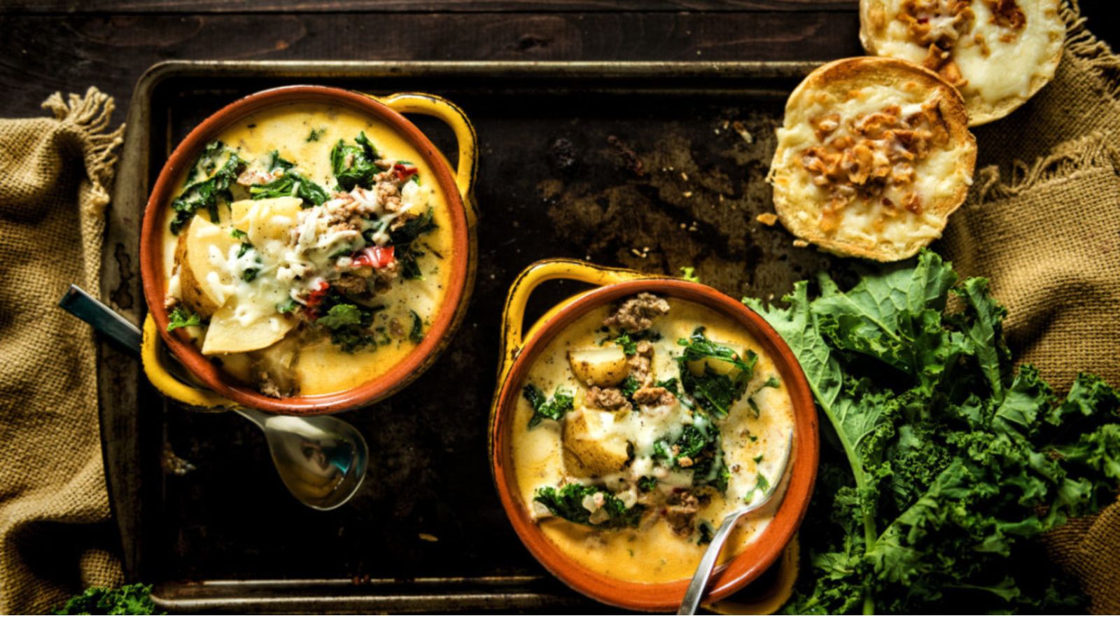 Zuppa Toscana made slow cooker style with kale, sausage, and creamy broth.