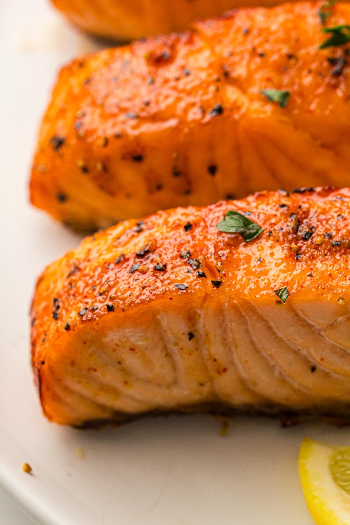 Close up of a salmon filets - showing the perfectly cooked meat.