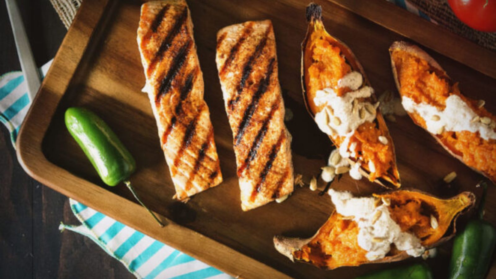 Salmon grilled with ancho rub topped with creamy nogada sauce.