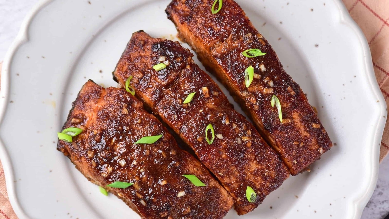 Baked Firecracker Salmon on a white plate.
