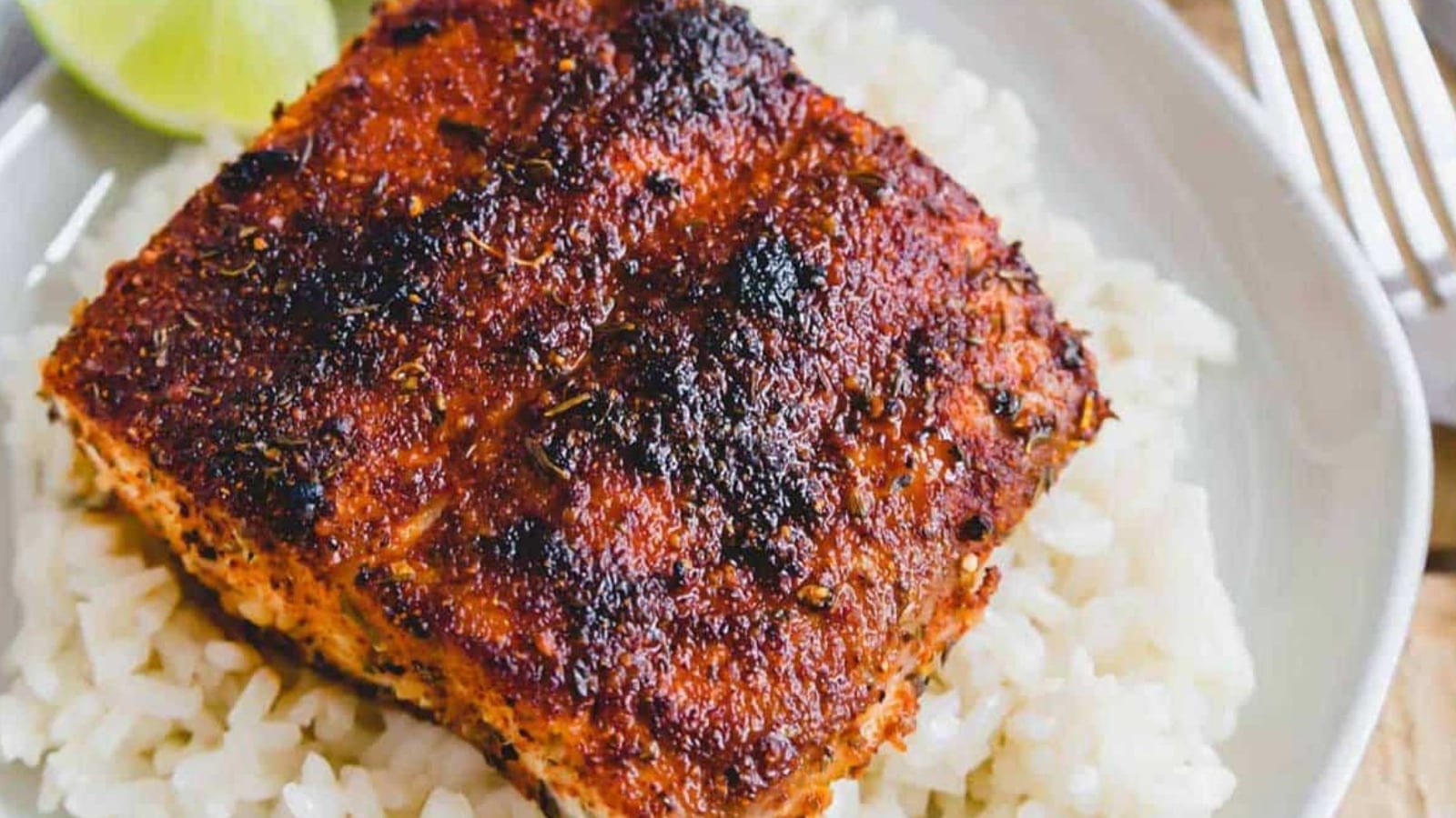 Blackened mahi mahi over white rice.