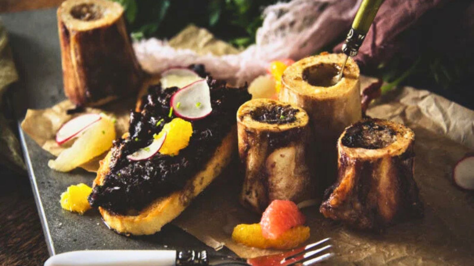 Bone marrow browned and topped with oxtail marmalade.