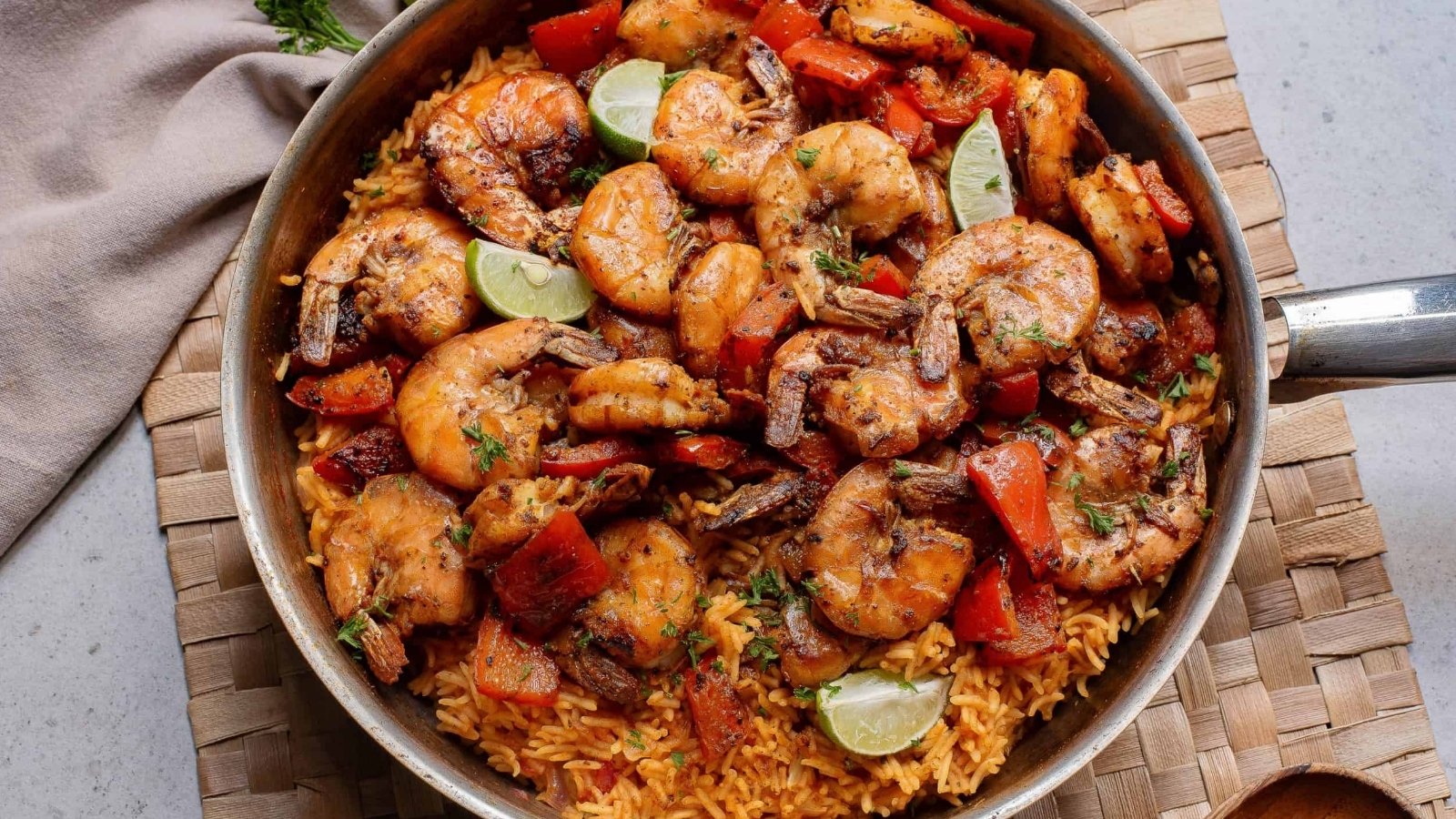Shrimp and rice in a skillet.