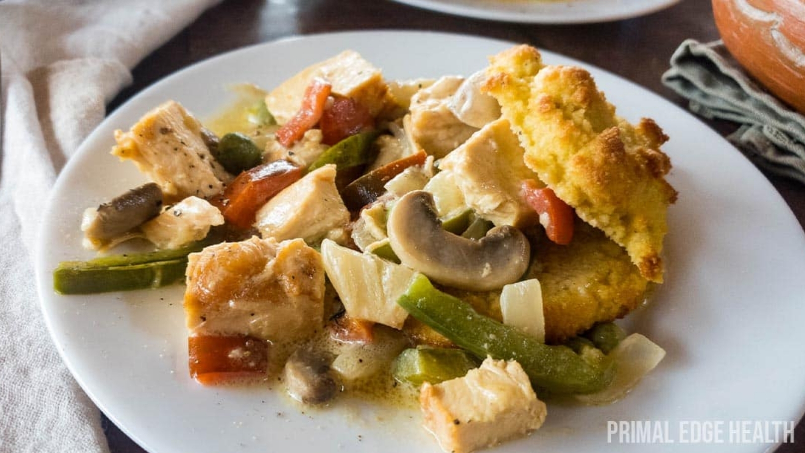 Chicken green beans mushrooms with biscuit.