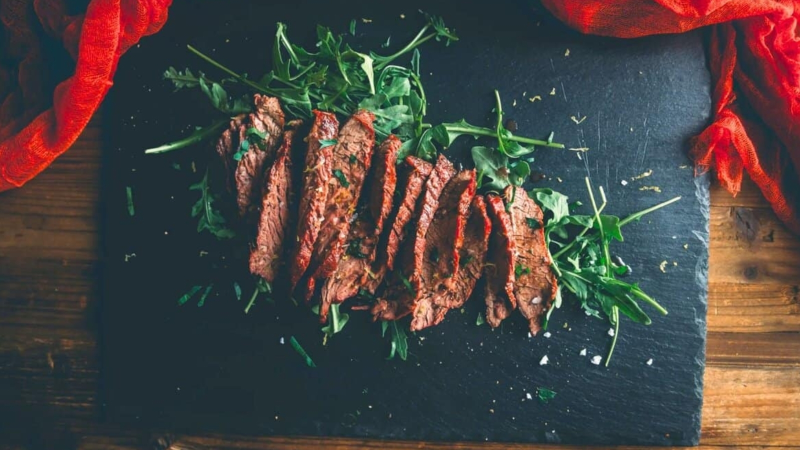 Grilled bavette steak sliced across grain with charred edges.