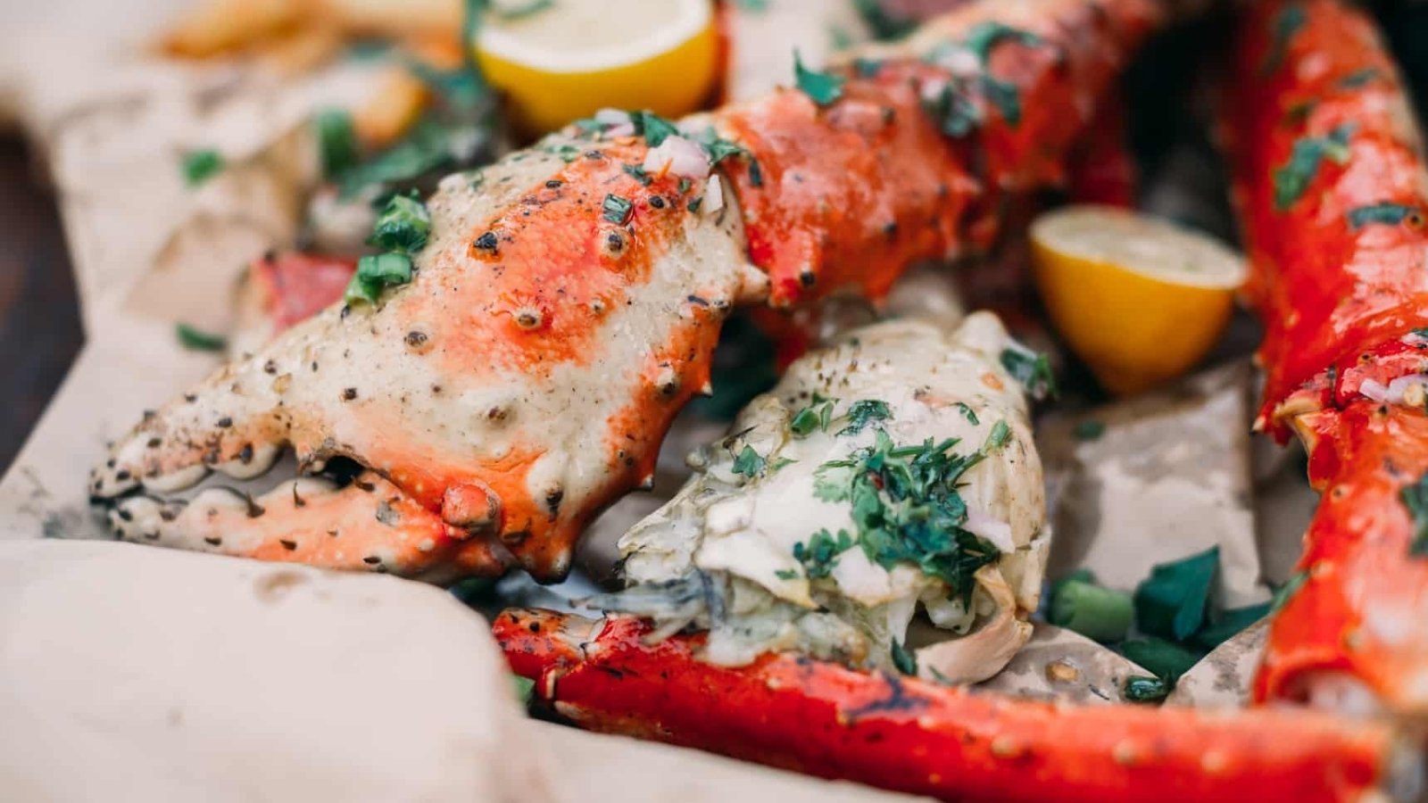Grilled king crab legs split open served with lemon butter.