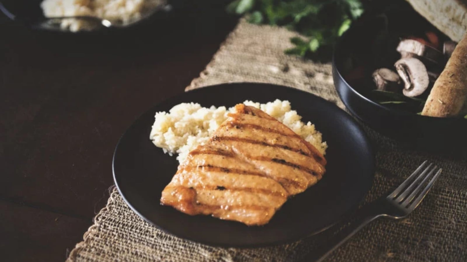 Salmon grilled until flaky with crisp skin and char marks.