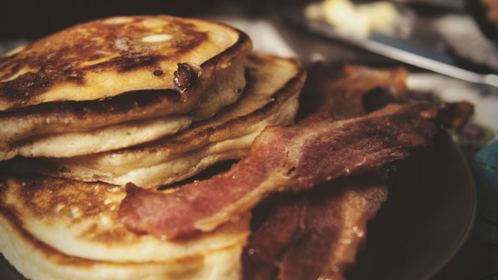 Pancakes infused with maple bacon pieces.