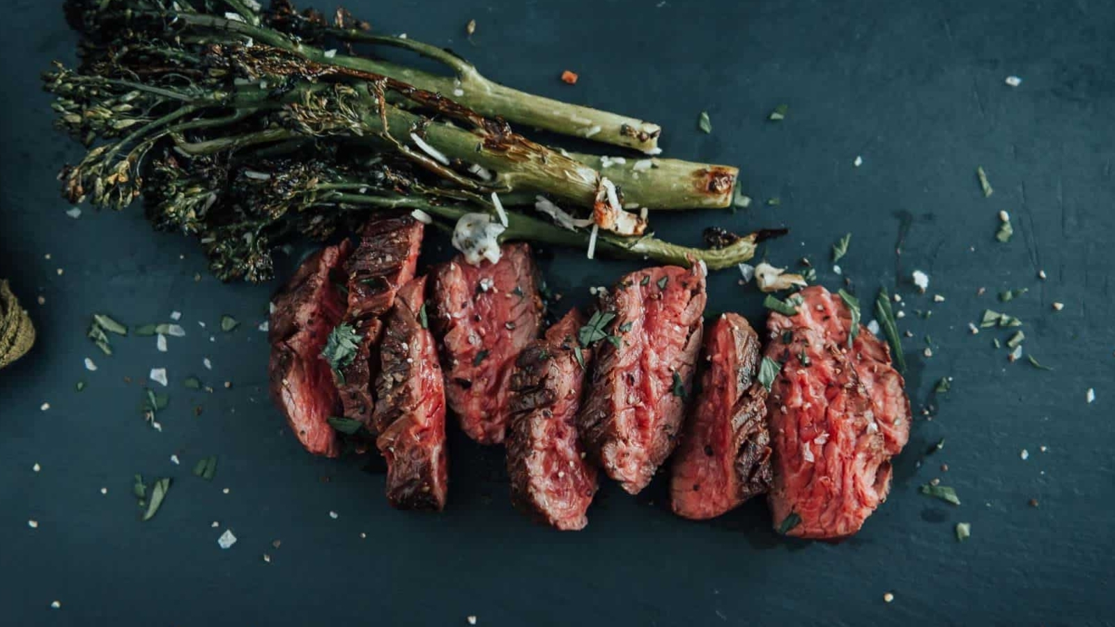 Pan-seared hanger steak with caramelized crust sliced against the grain.