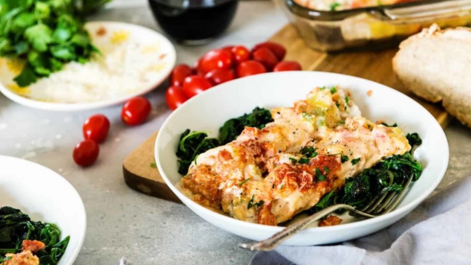 Manicotti stuffed with tender veal and Florentine filling baked until the pasta edges brown and sauce bubbles.