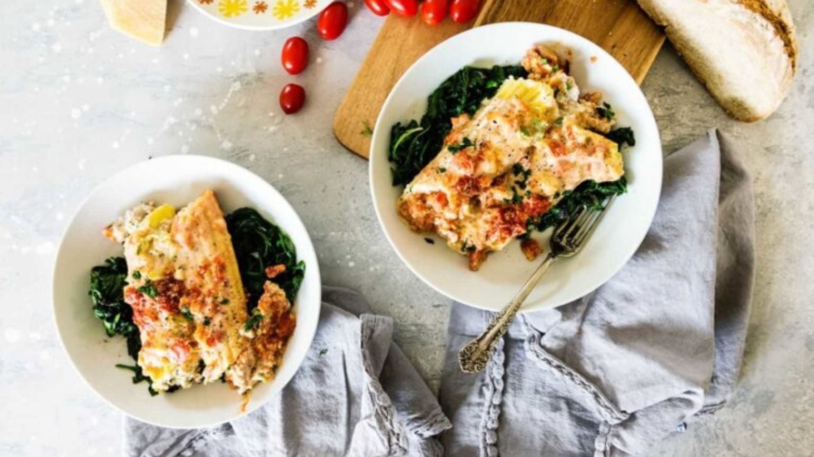 Manicotti stuffed with tender veal and Florentine filling baked until the pasta edges brown and sauce bubbles.