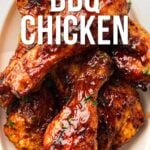 Plate of glazed BBQ chicken drumsticks with text overlay reading "How to Make Air Fryer BBQ Chicken" and a website link at the bottom for the full recipe.