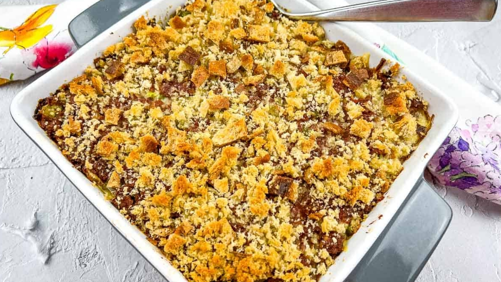 Corned Beef Hash Casserole in a square baking dish.