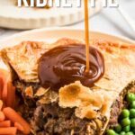 A slice of steak and kidney pie on a plate, topped with gravy, served with peas and carrots. Text reads: "How to make steak and kidney pie.