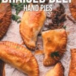 Golden brown hand pies filled with stout braised beef are arranged on parchment paper with herbs, accompanied by recipe text.