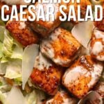 Close-up of Caesar salad topped with hot honey salmon bites, Caesar dressing, shaved Parmesan, and the text "How to Make Hot Honey Salmon Caesar Salad.