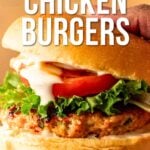 A hand holds a buffalo chicken burger with lettuce, tomato, and sauce in a bun. Text reads "How to Make Buffalo Chicken Burgers.