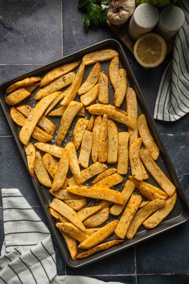 The fries baked golden and crisp on the sheet pan, seasoned with salt and pepper straight out of the oven.